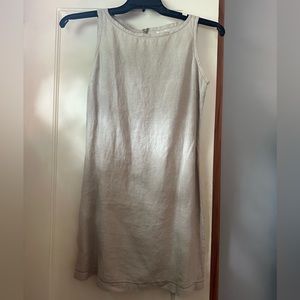 Tan classic dress with cute neckline & hemline. Size 6